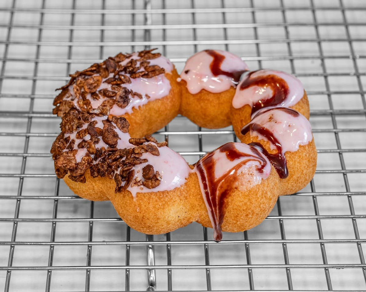 a chocolate doughnut on a plate