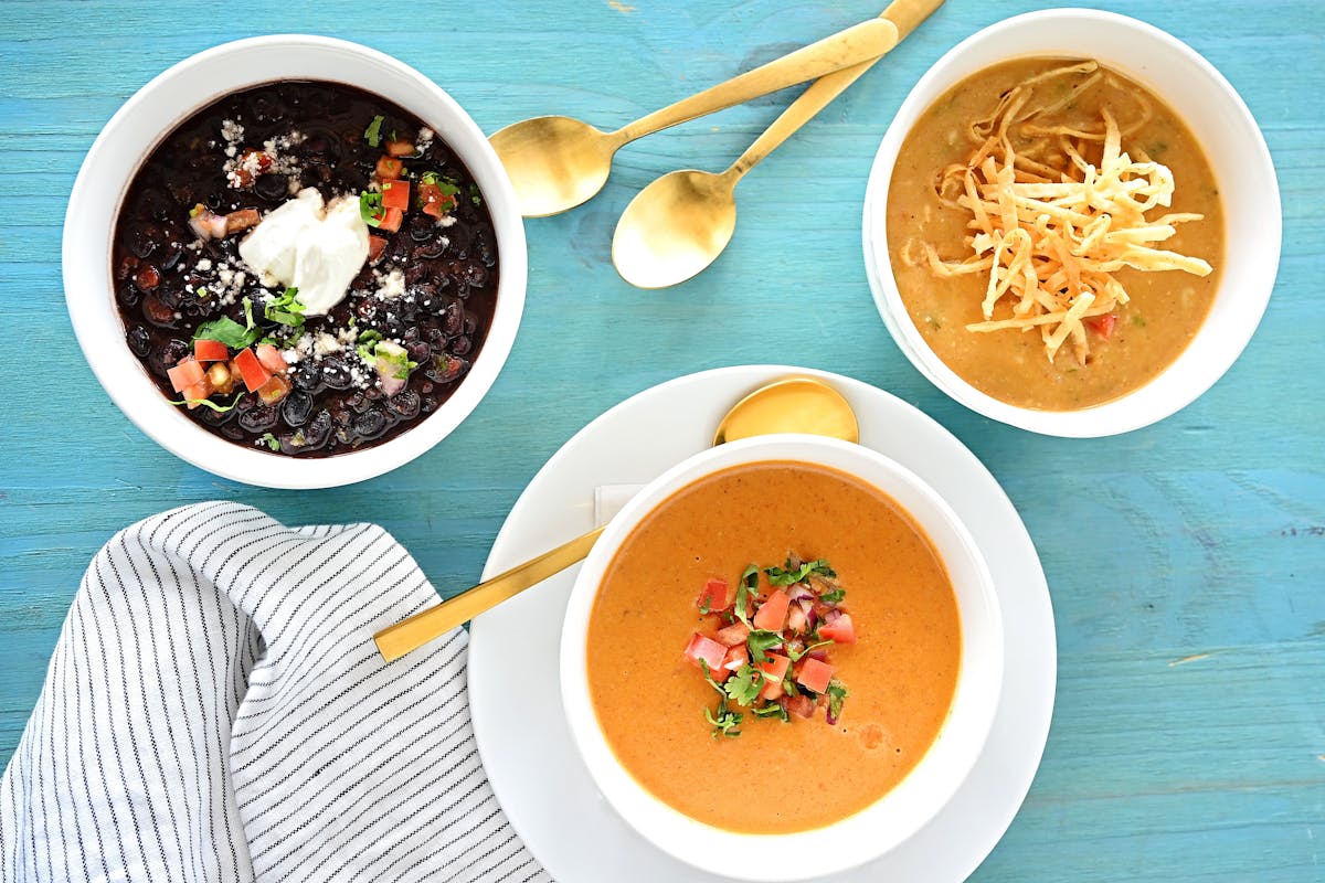 a bowl of food sitting on a table