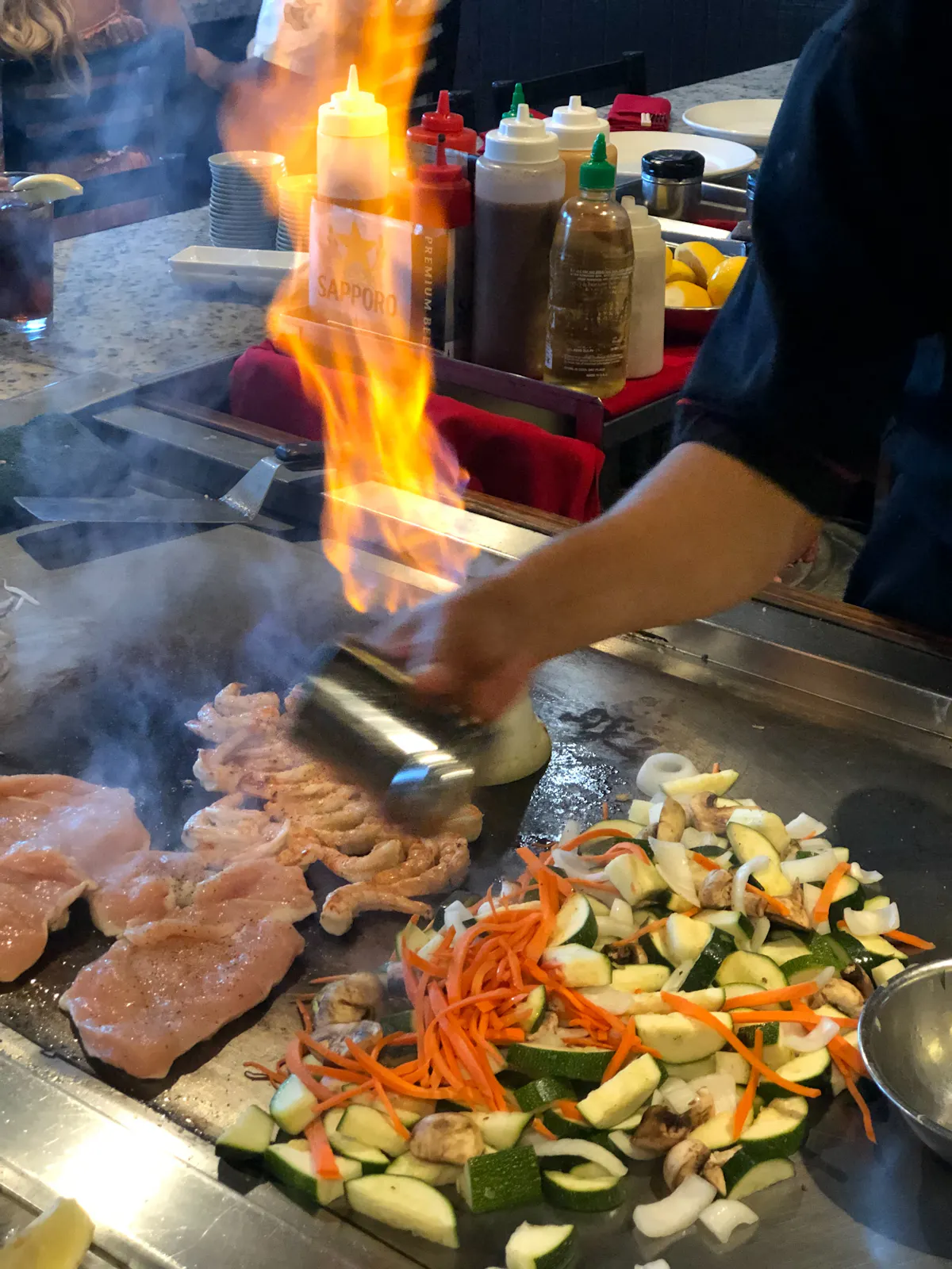 a pan of food on a grill