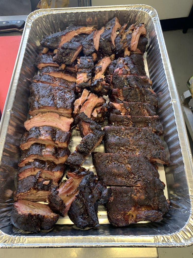 a tray of food on a grill