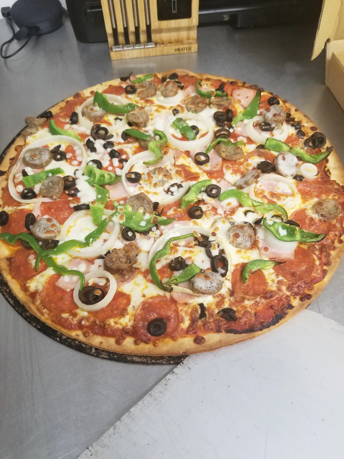 a pizza sitting on top of a table