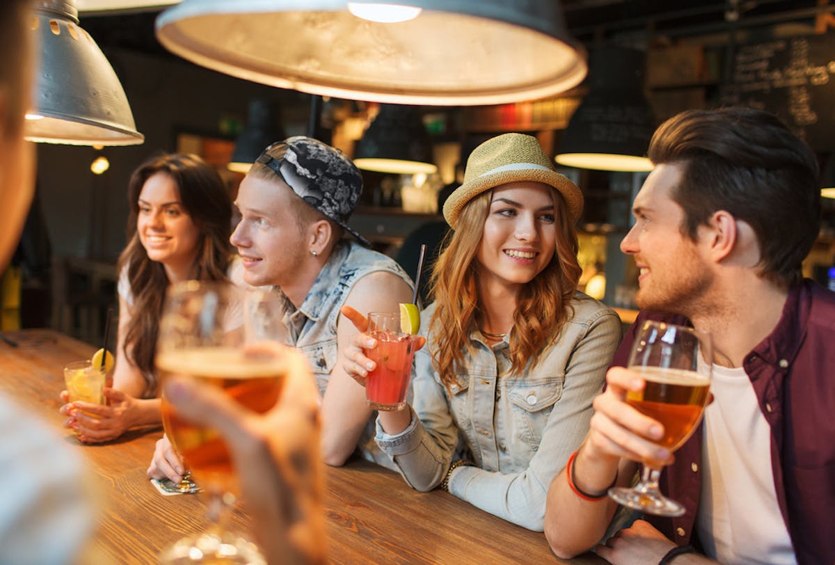 Friends having drinks at a bar
