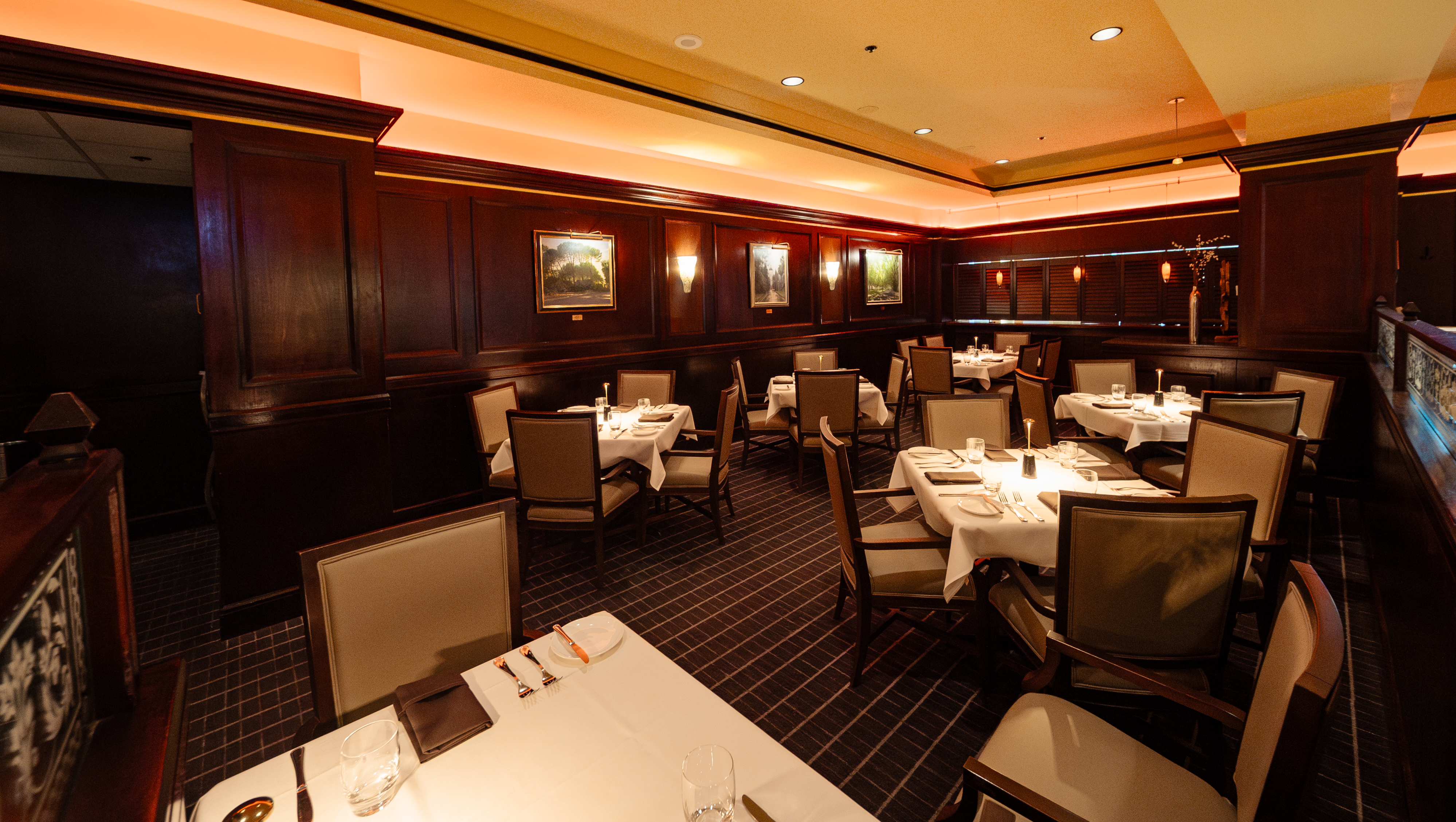 a room with tables and chairs