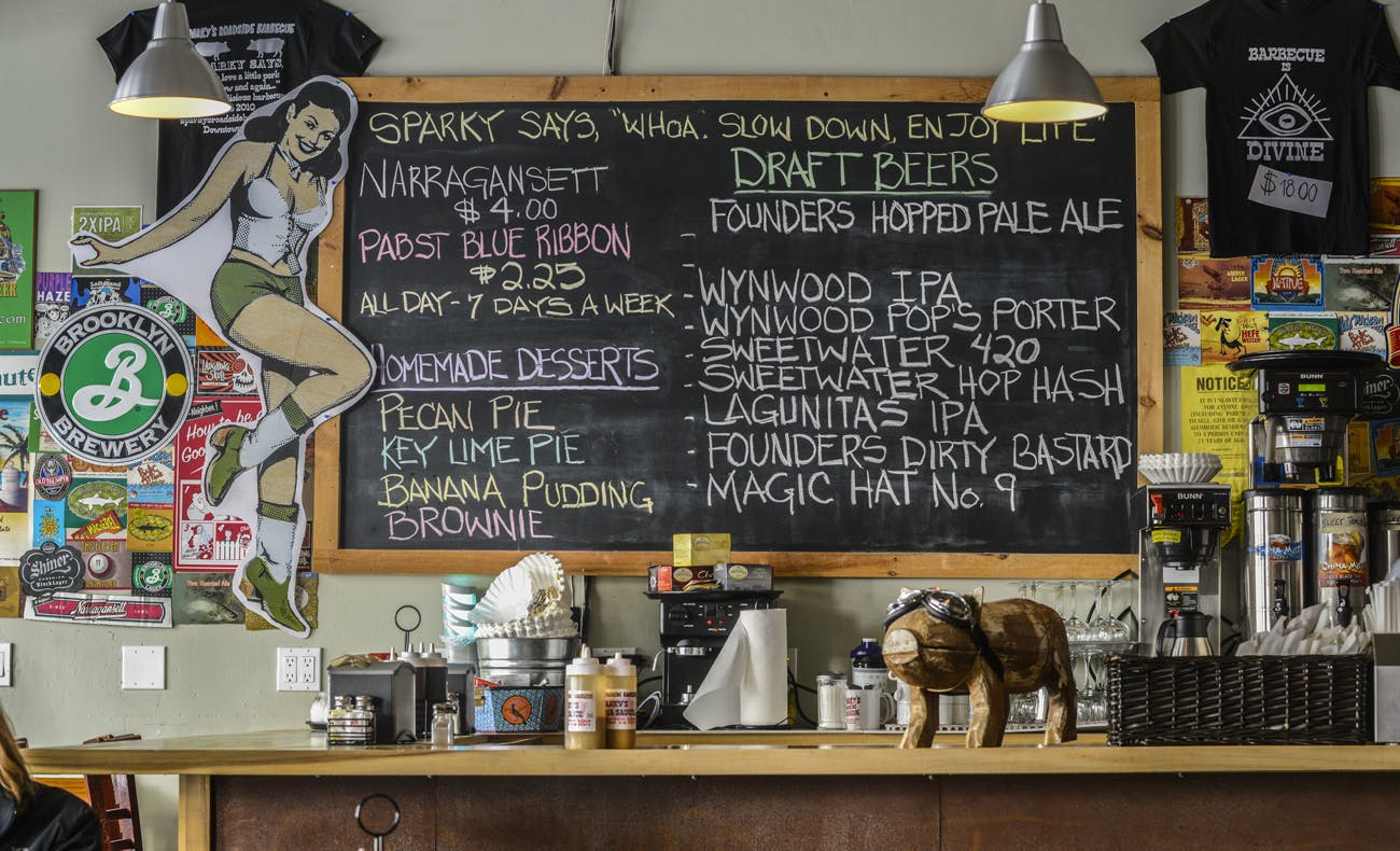 A chalkboard and several items on a top