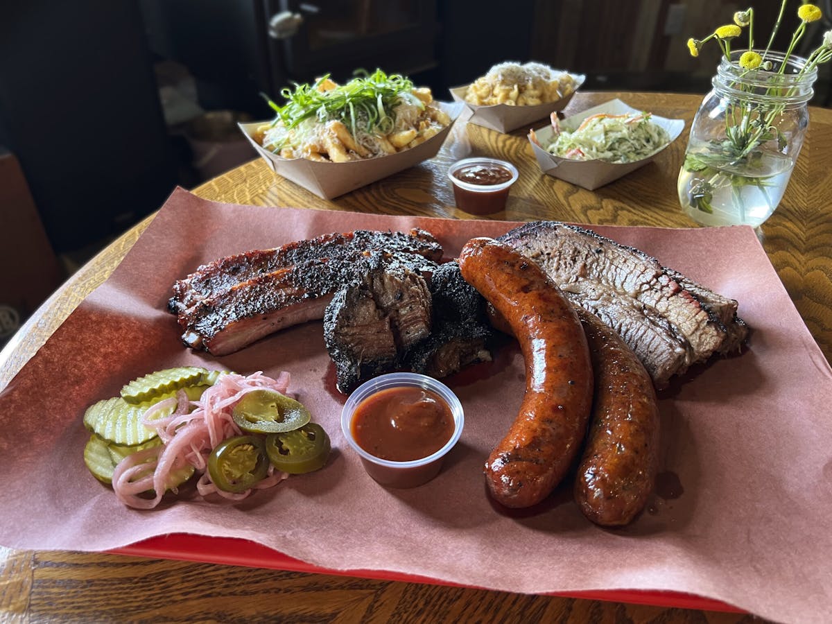 a table topped with different types of food on a plate