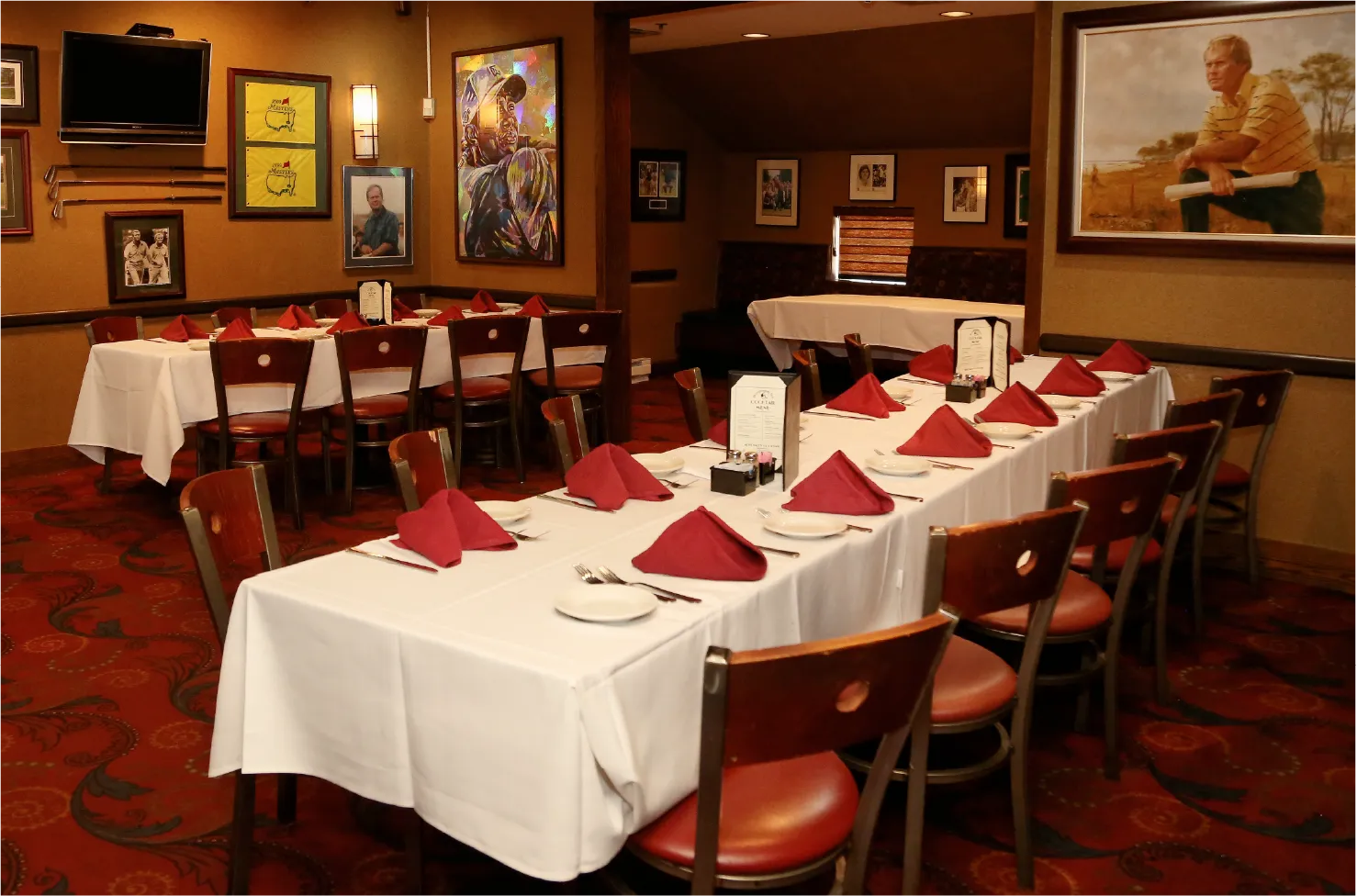 Skybox Golf Room private dining space with golf-themed decor and artwork