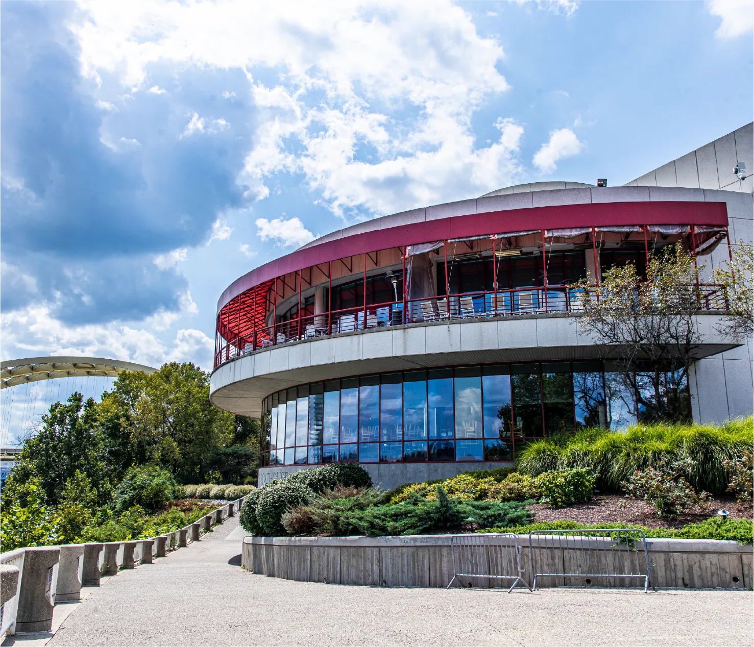 The Boathouse exterior view with red-accented private dining terrace