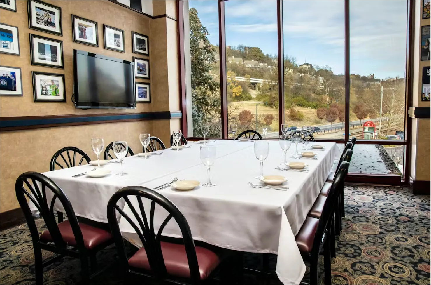 Kentucky Speedway Room private dining table with riverside window view