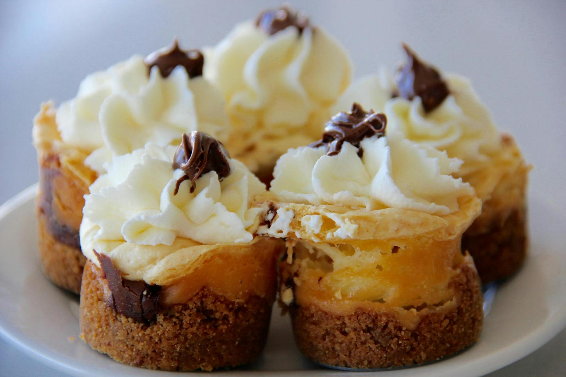 a close up of a slice of cake and ice cream on a plate