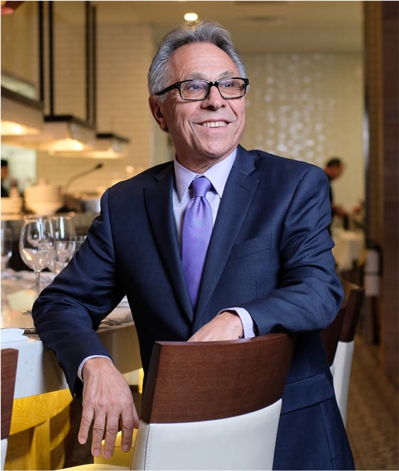 Robert Walden wearing a suit and tie