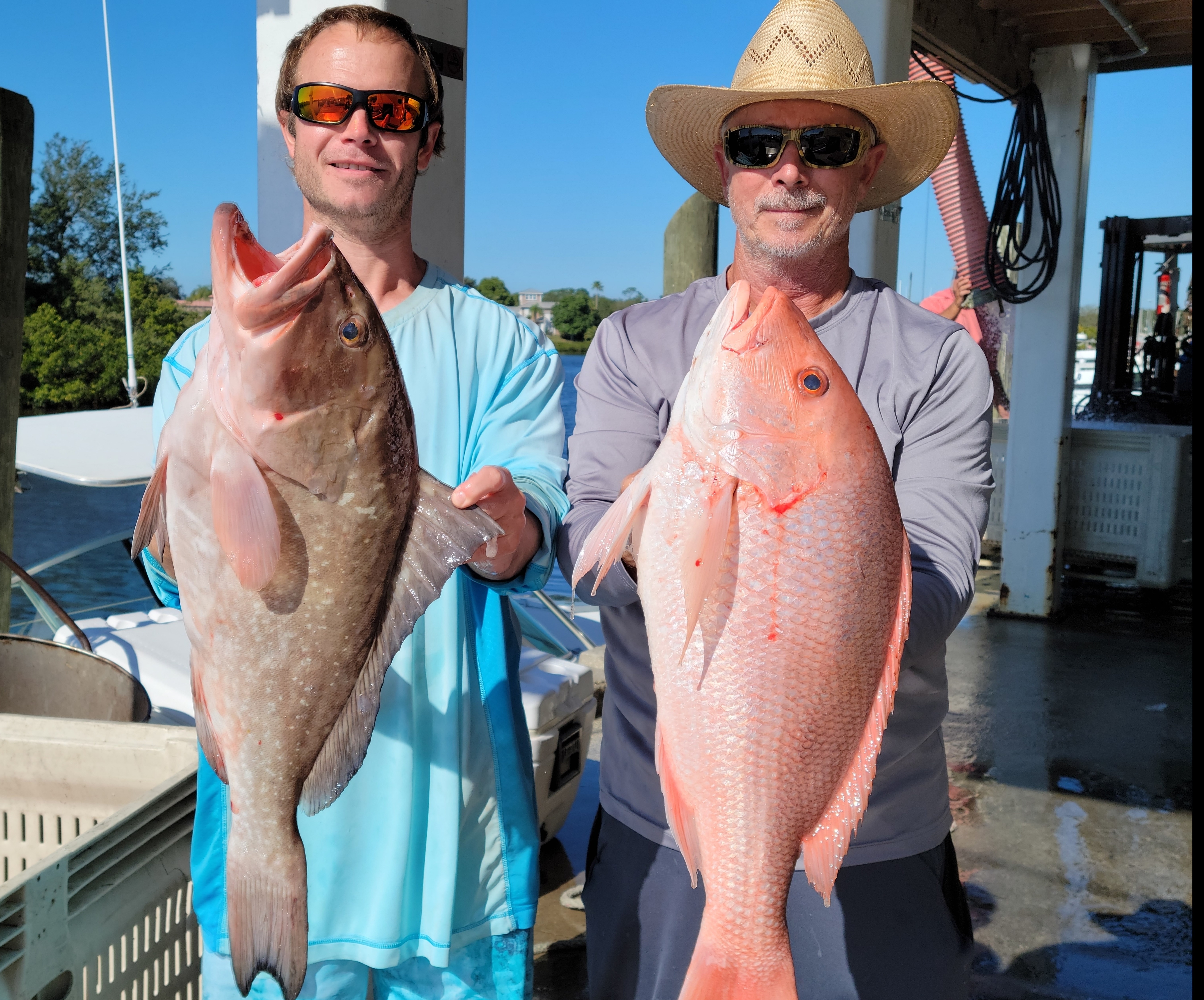 a person holding a fish