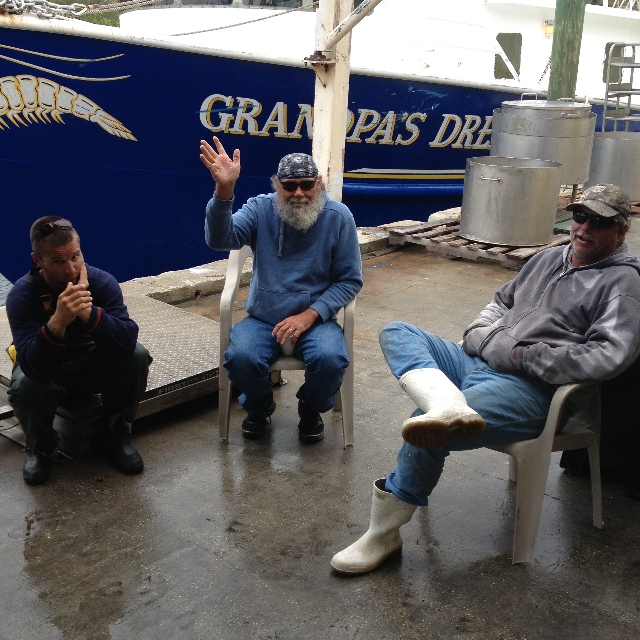 a group of people sitting on a bench