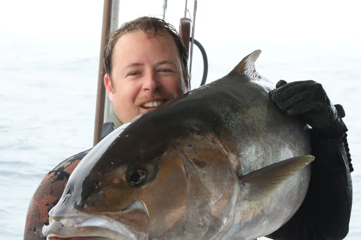 a man holding a giant fish