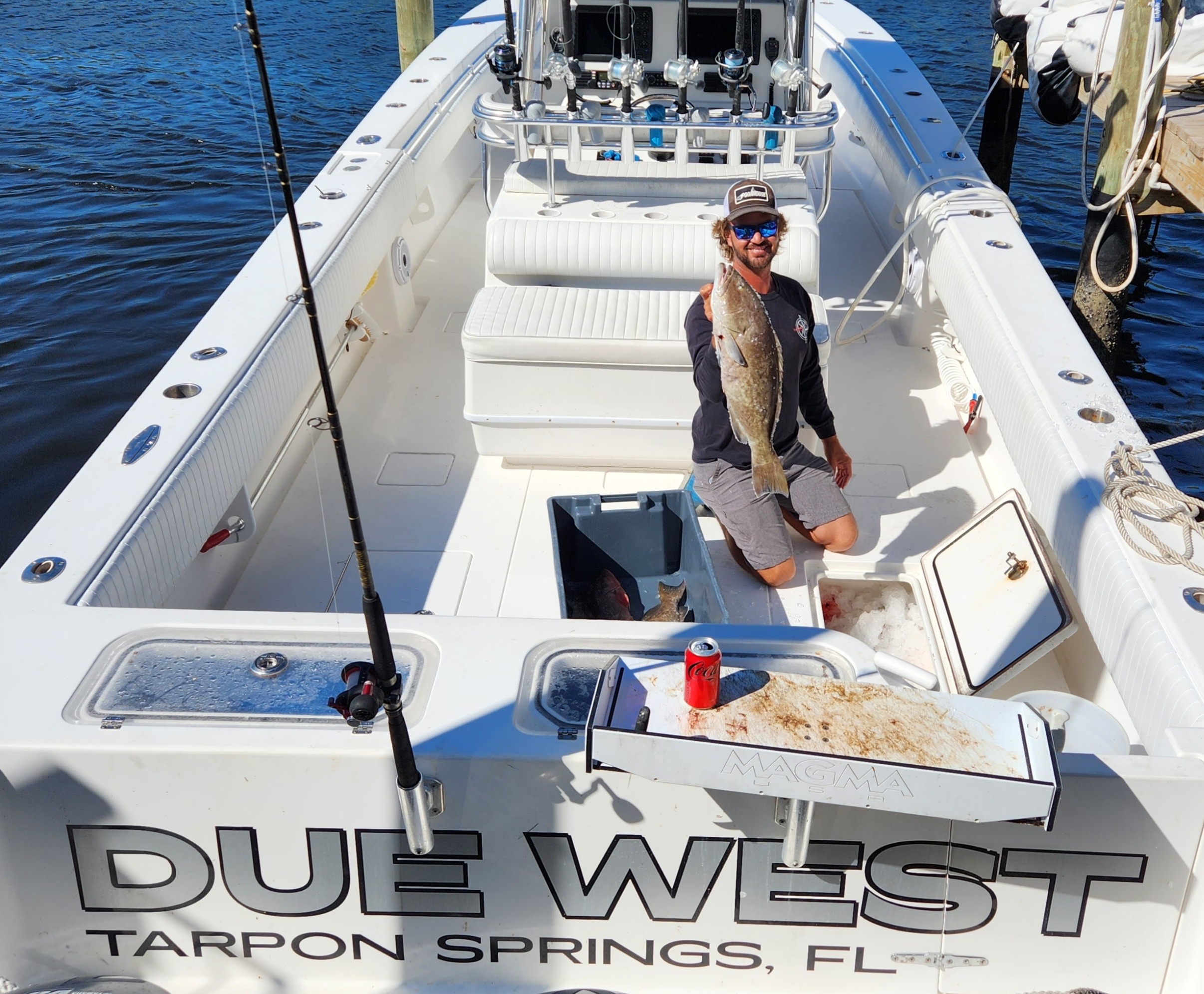 a group of people on a boat in the water