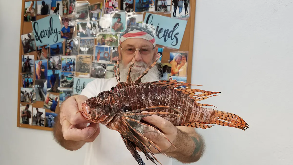 a person holding a lobster