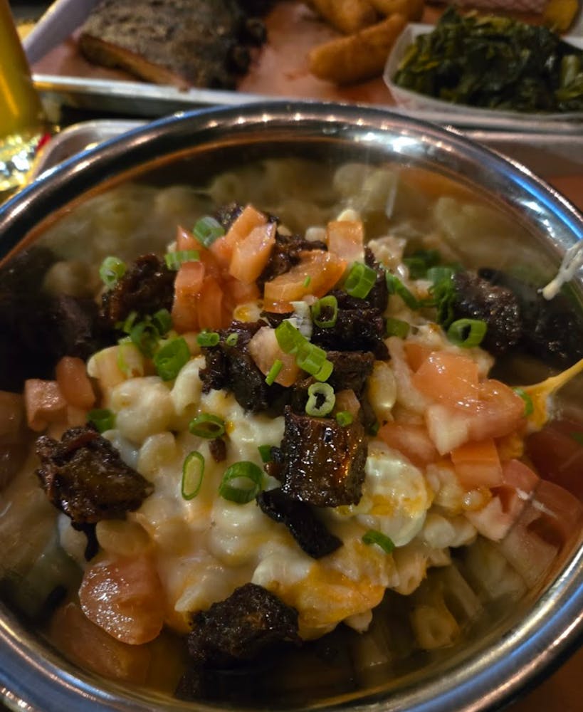 a cup of coffee and a glass of beer on a table