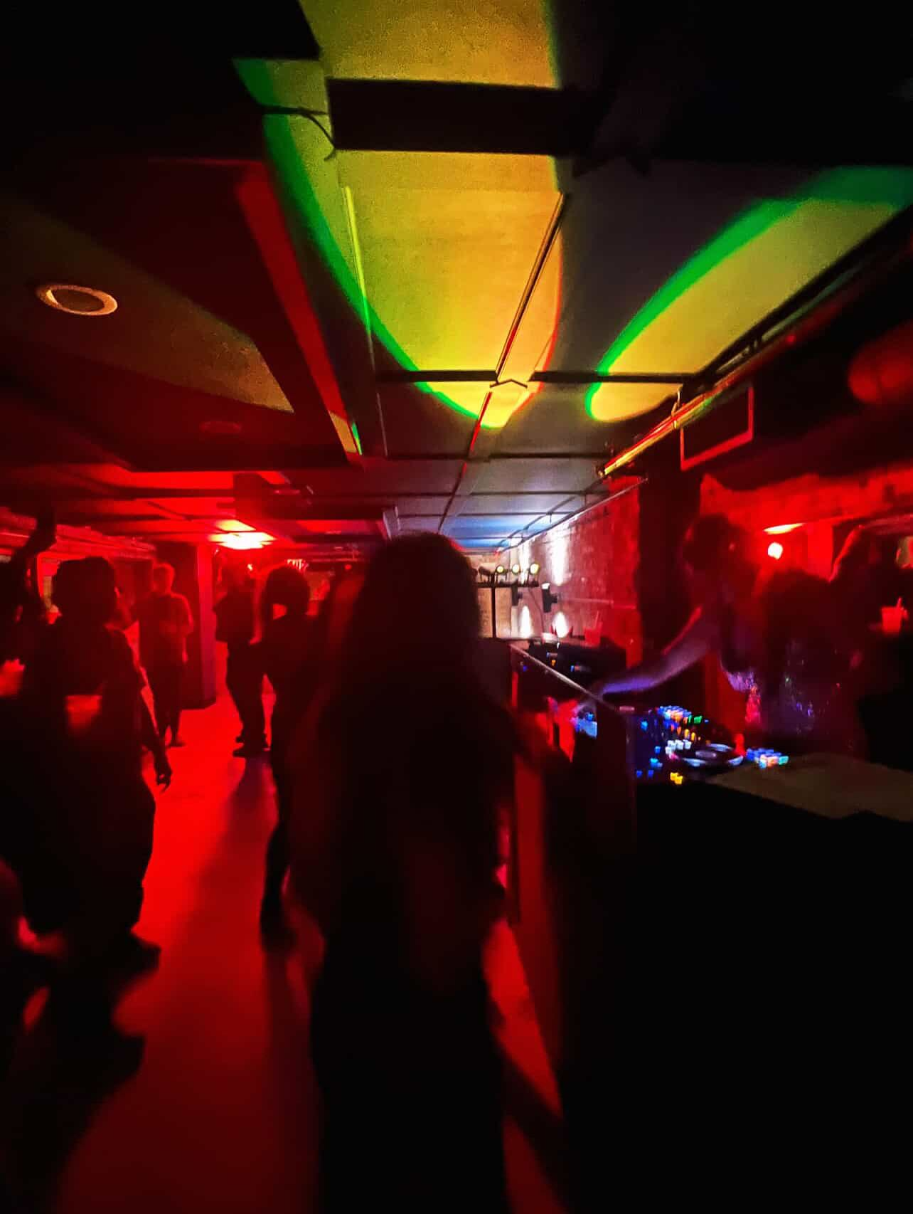 a group of people in a dark room