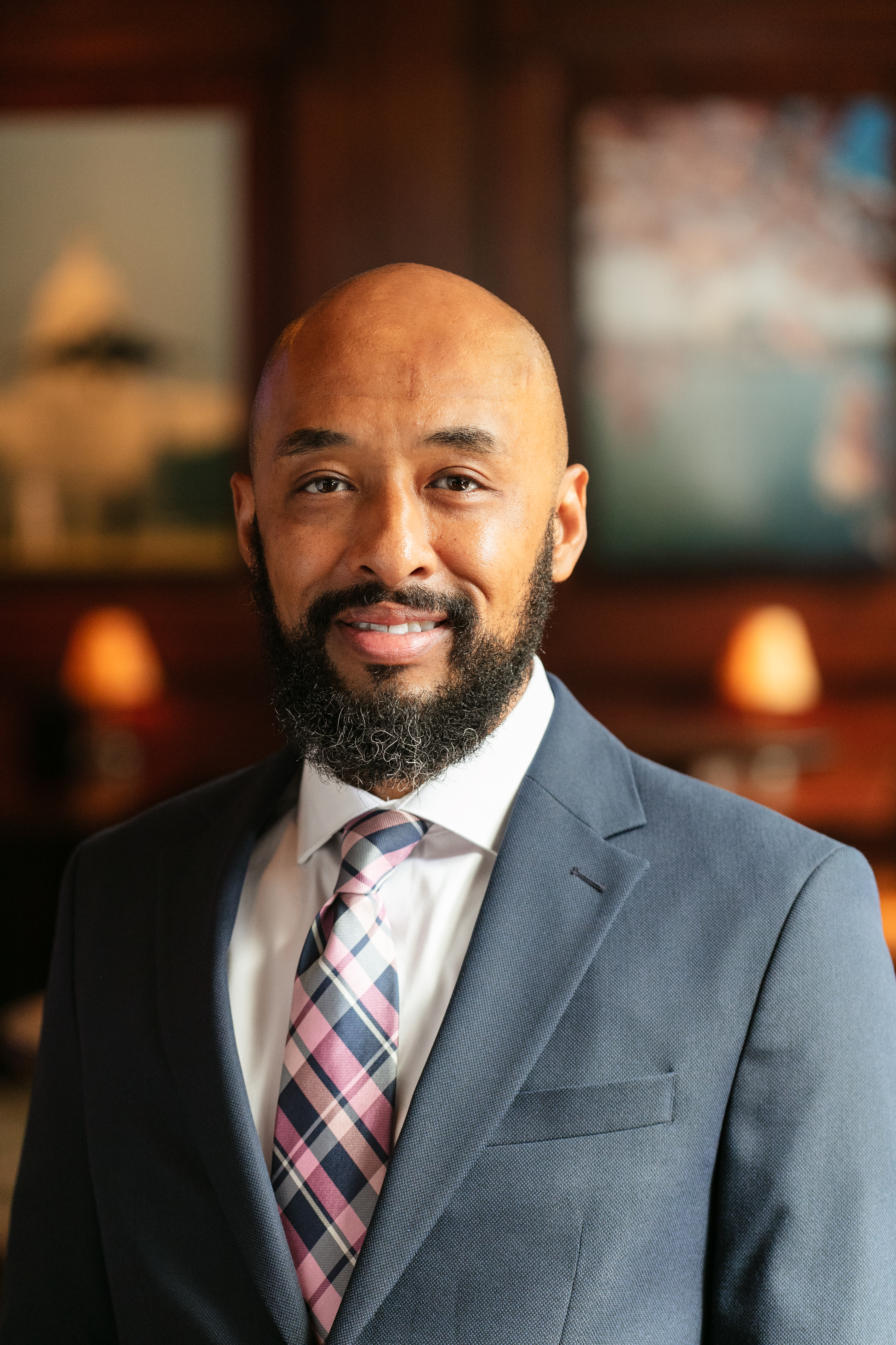 Tray Deee wearing a suit and tie