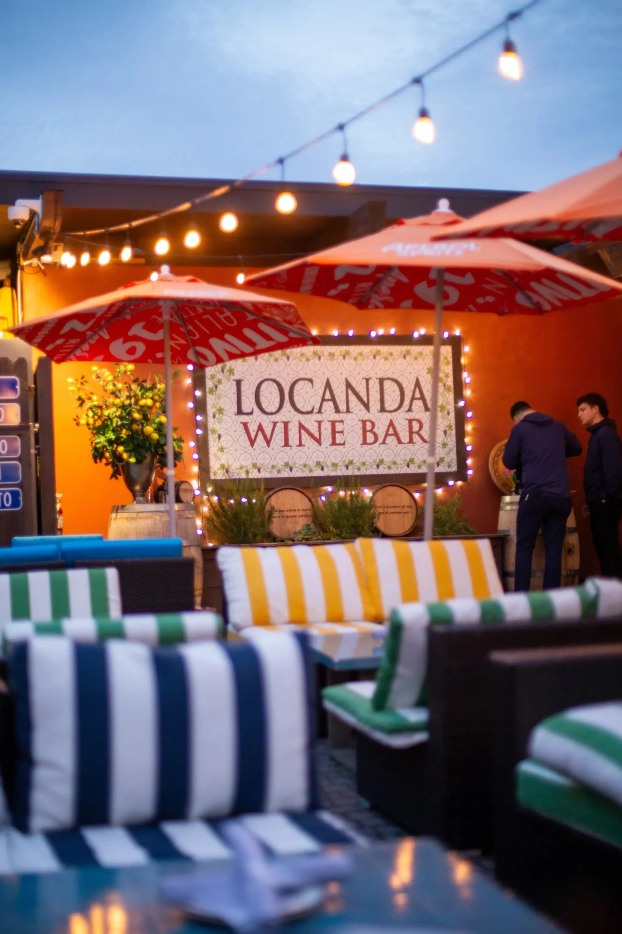 a place with patio chairs and tables