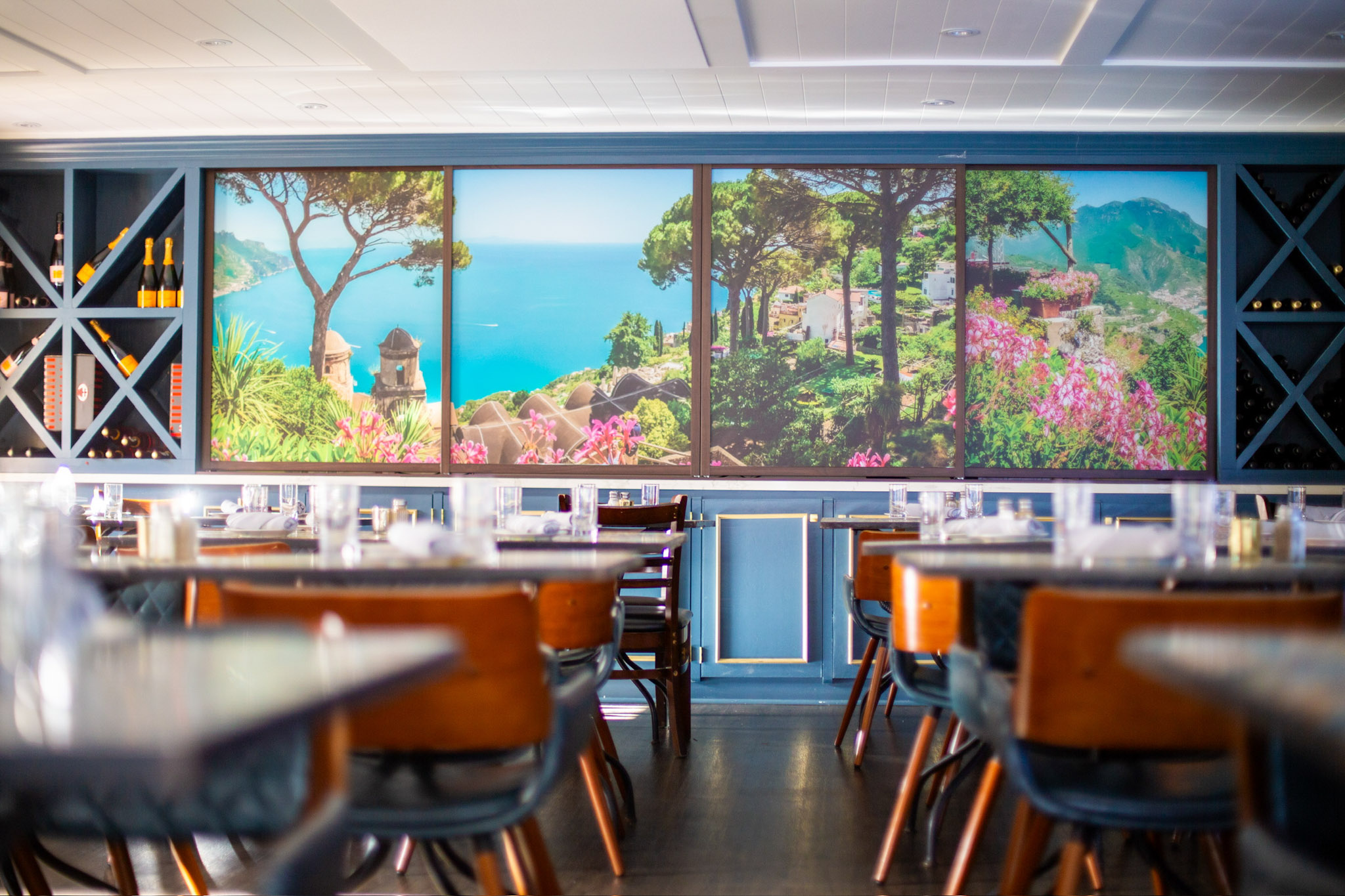 a dining room table in front of a window