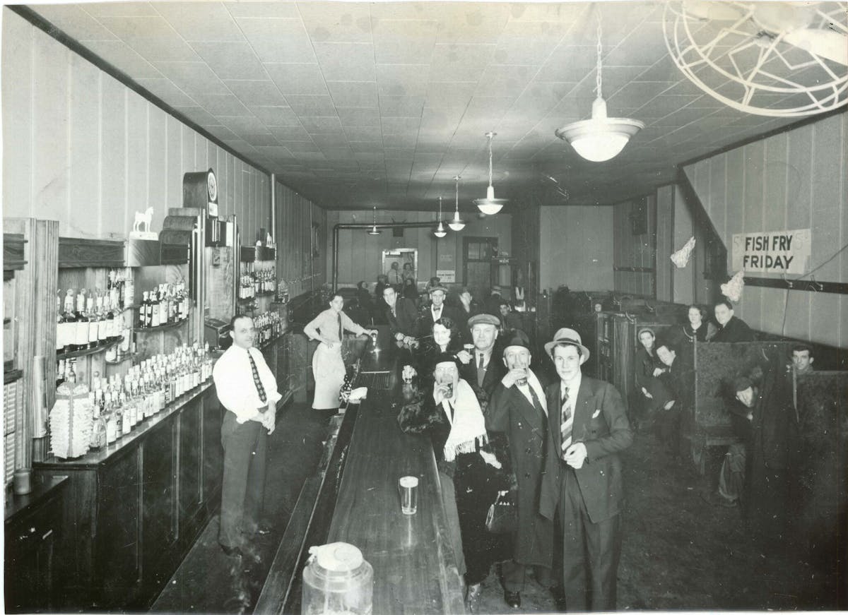 a group of people standing in front of a building