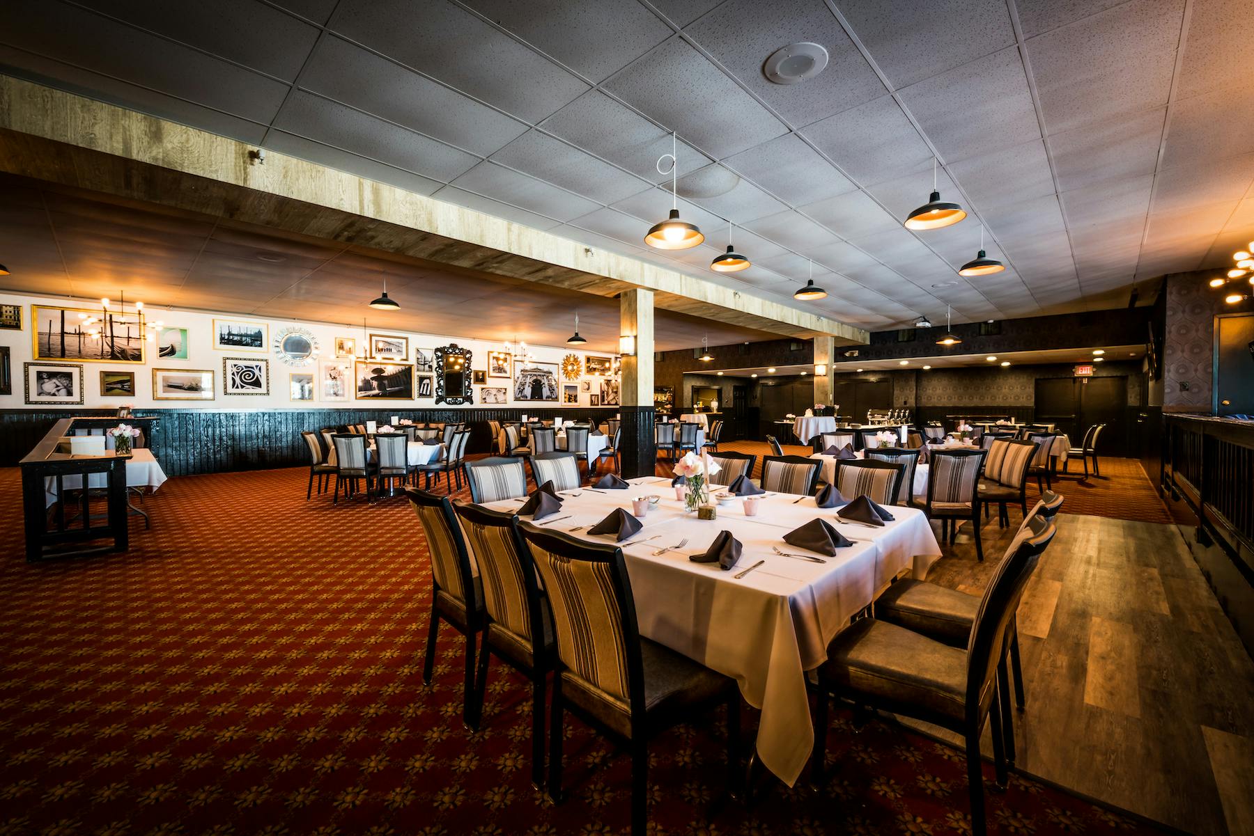 a large room with tables and chairs