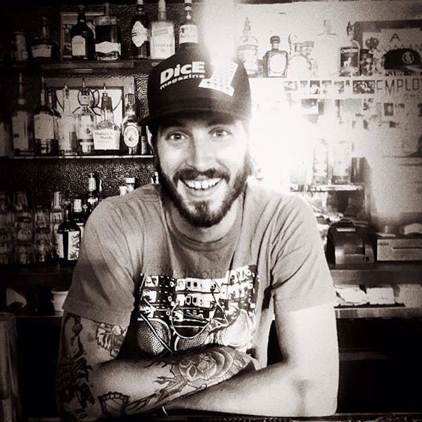 a man sitting at a table in a restaurant