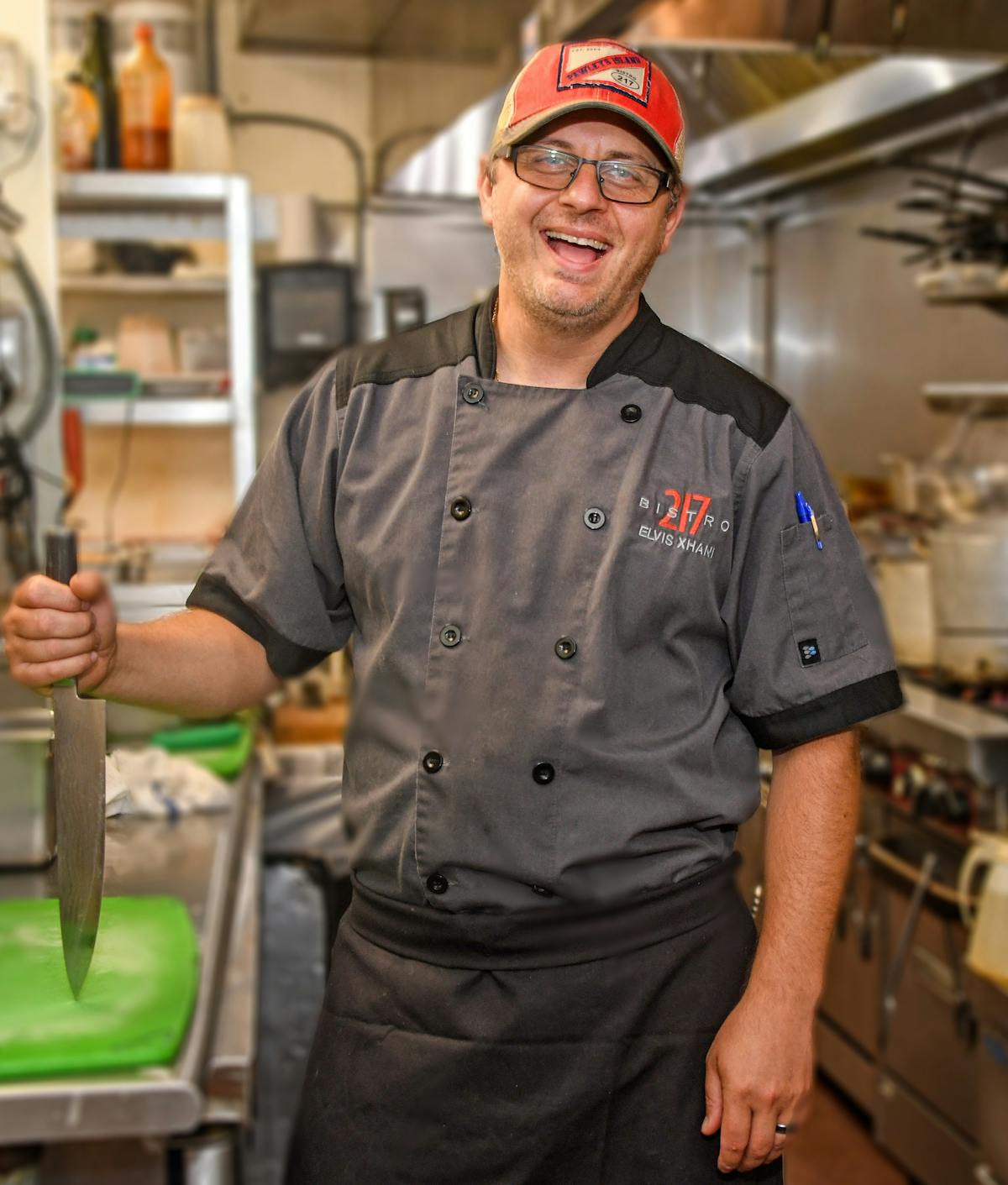 a man standing in a kitchen