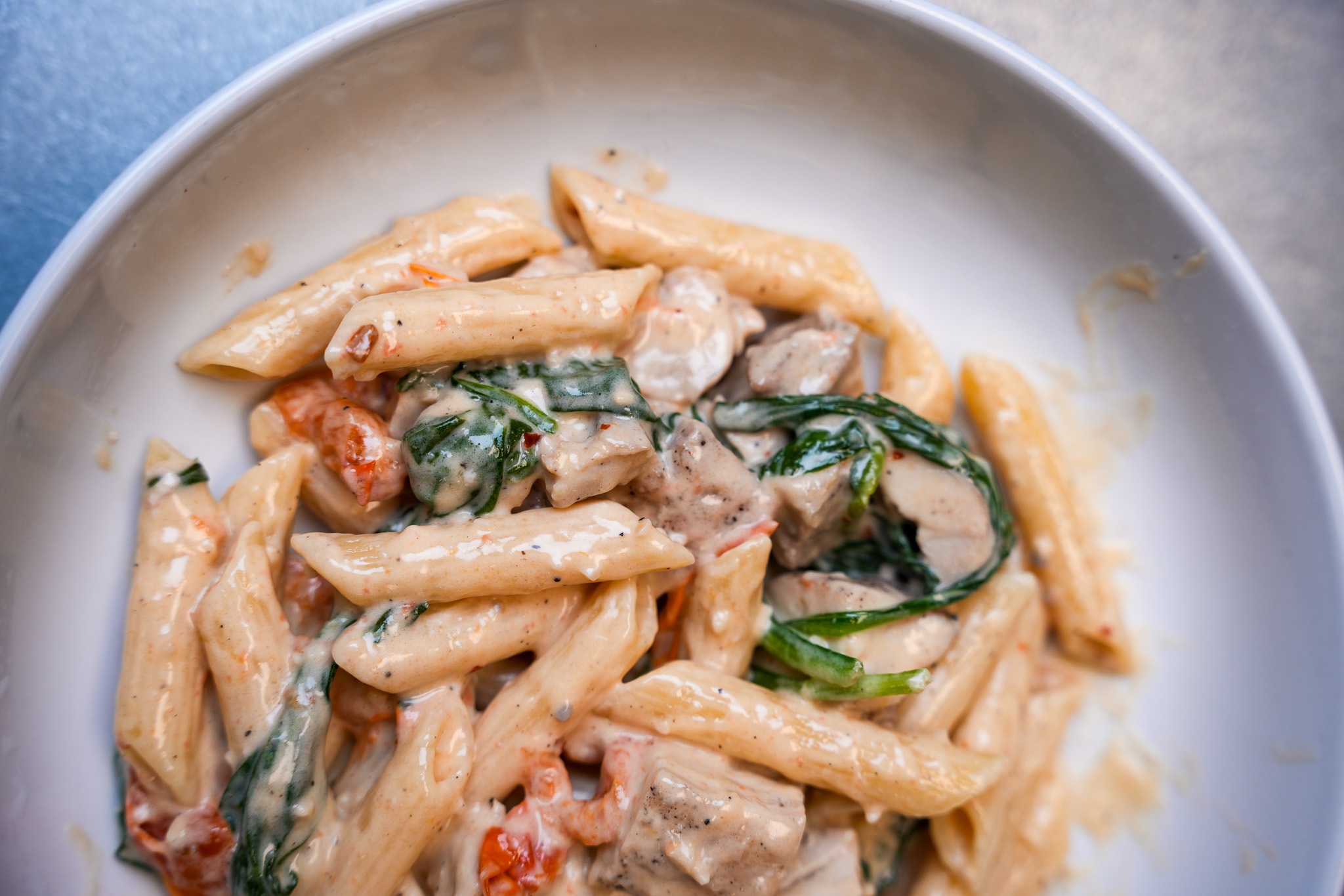 a bowl of pasta with sauce