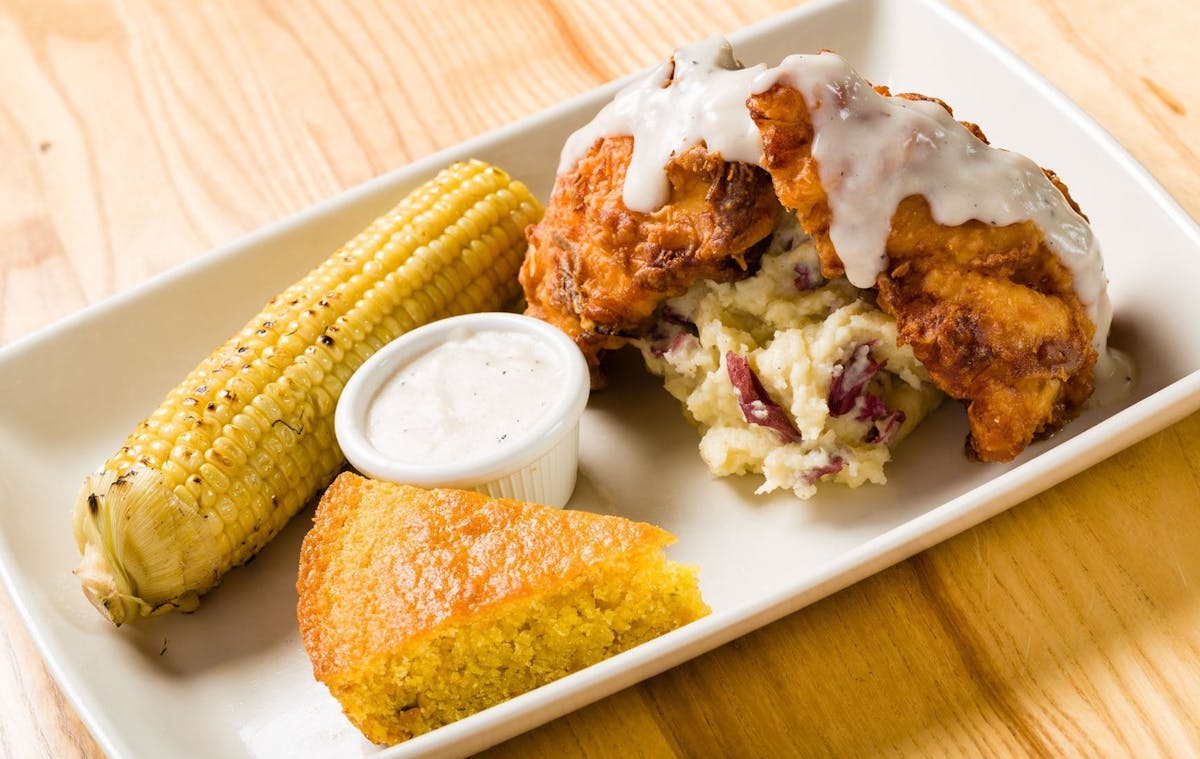 corn, corn bread and fried chicken with mashed potatoes