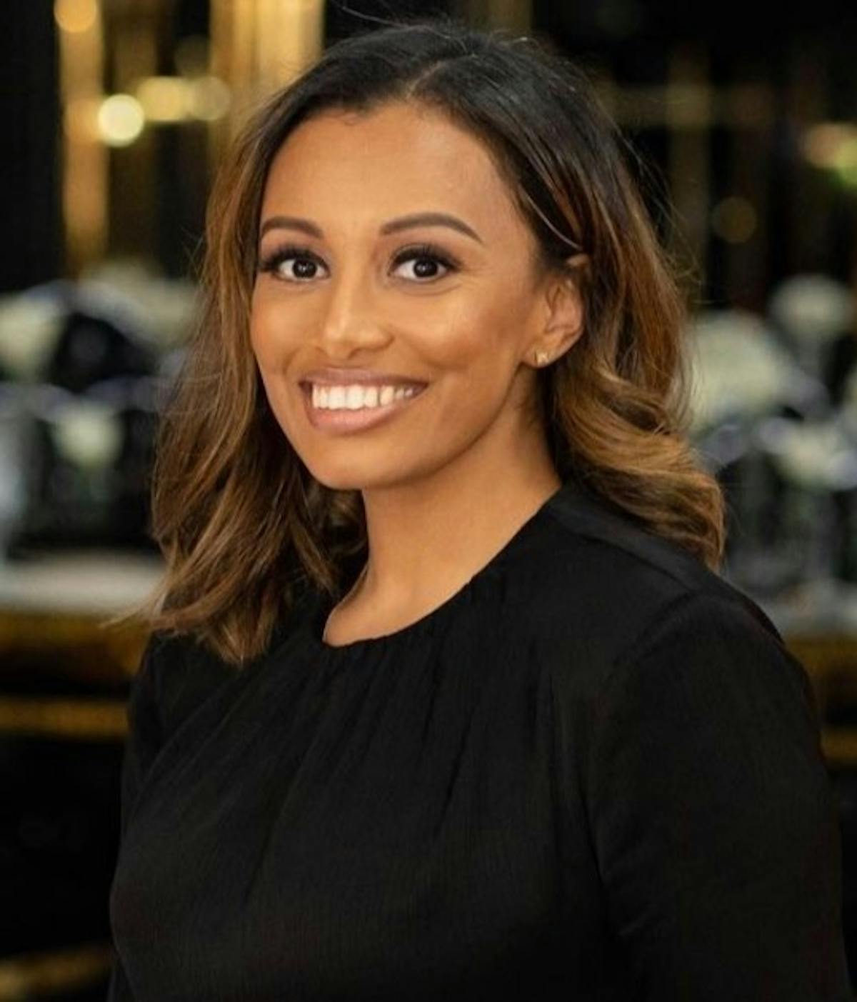 a woman smiling for the camera