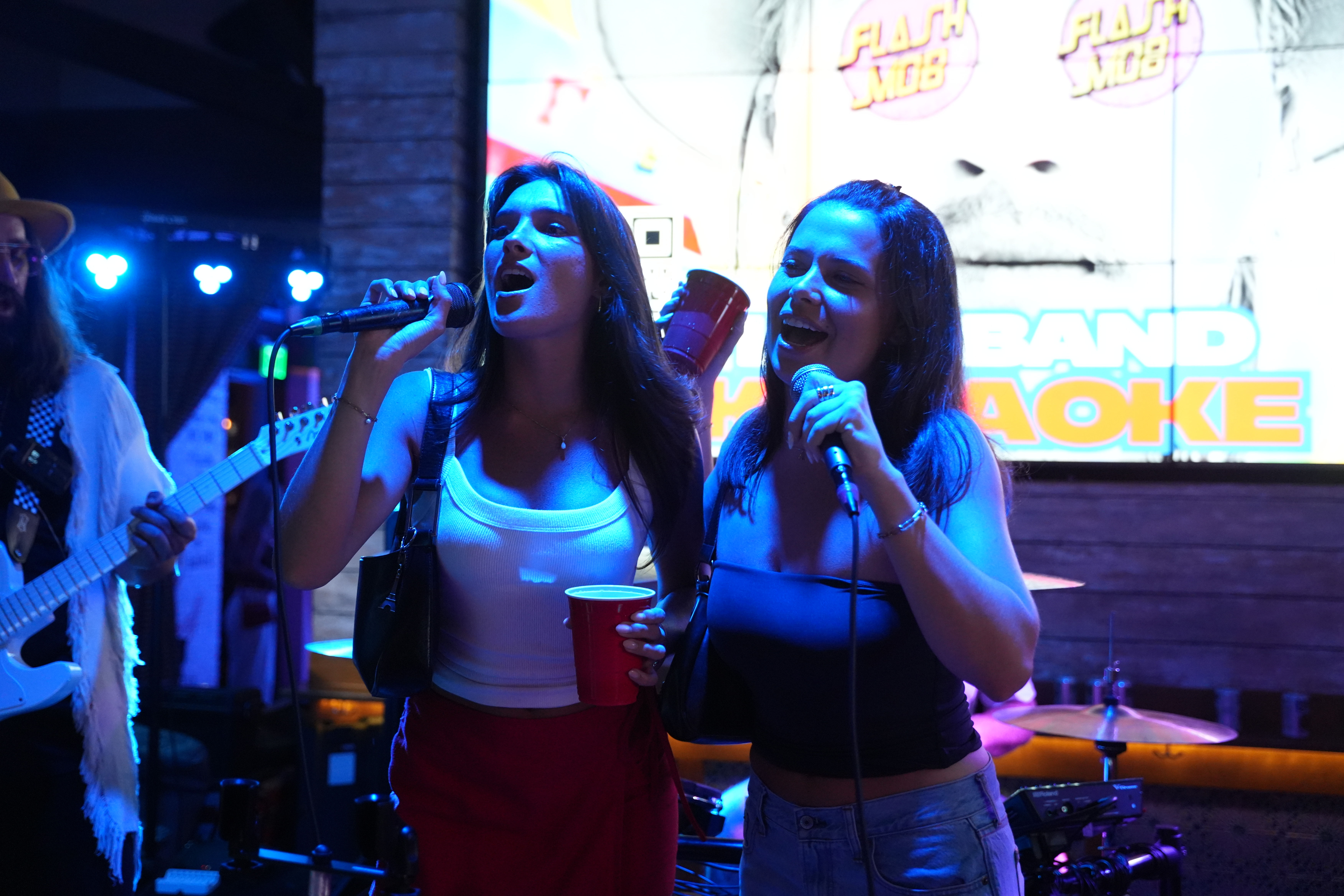 a couple of girls singing