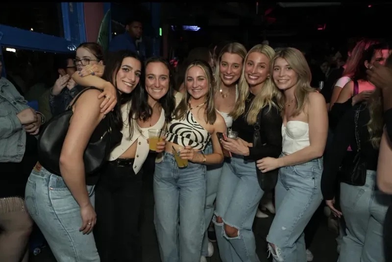 a group of people posing for a photo