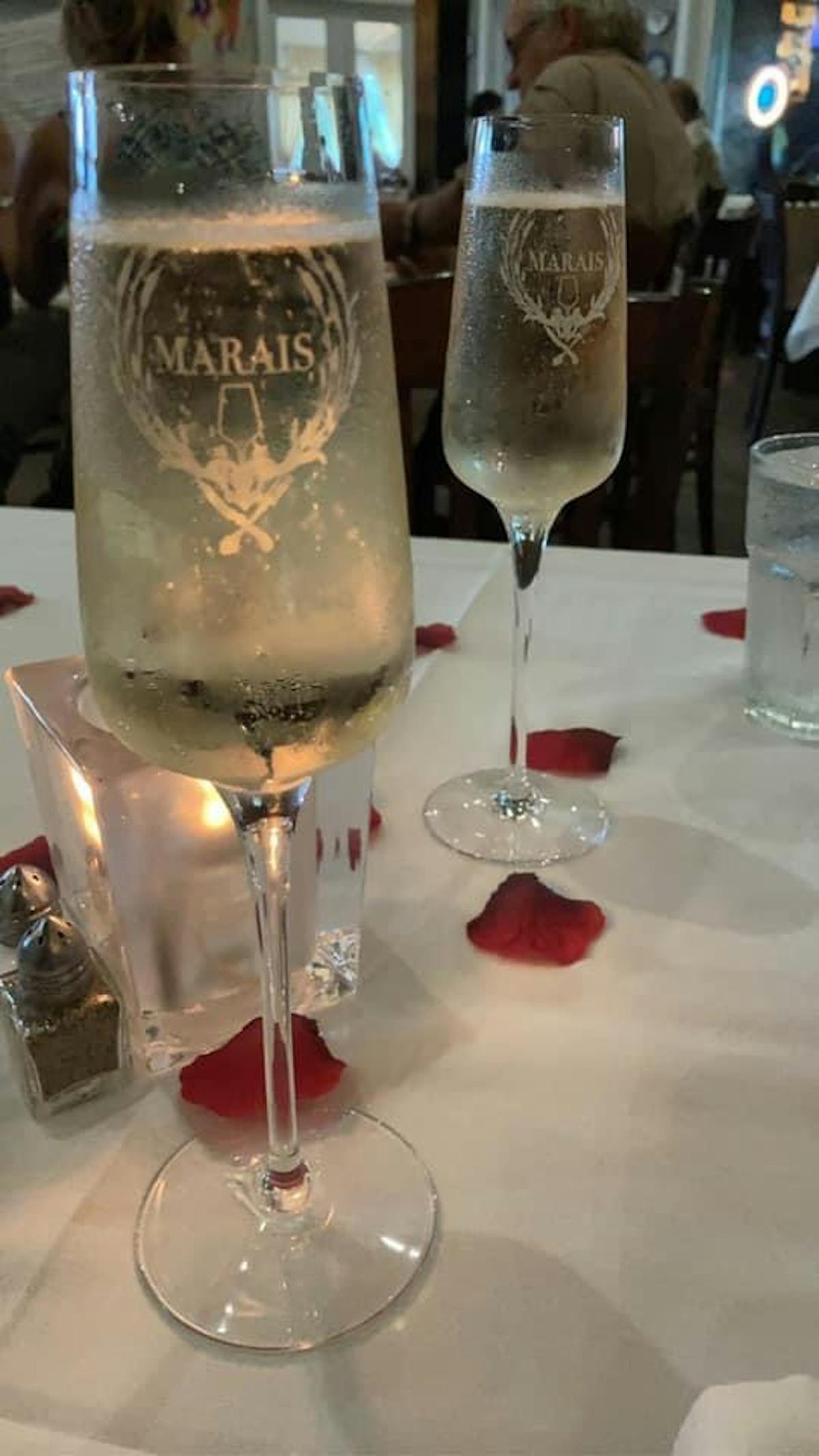 a glass of wine on a table