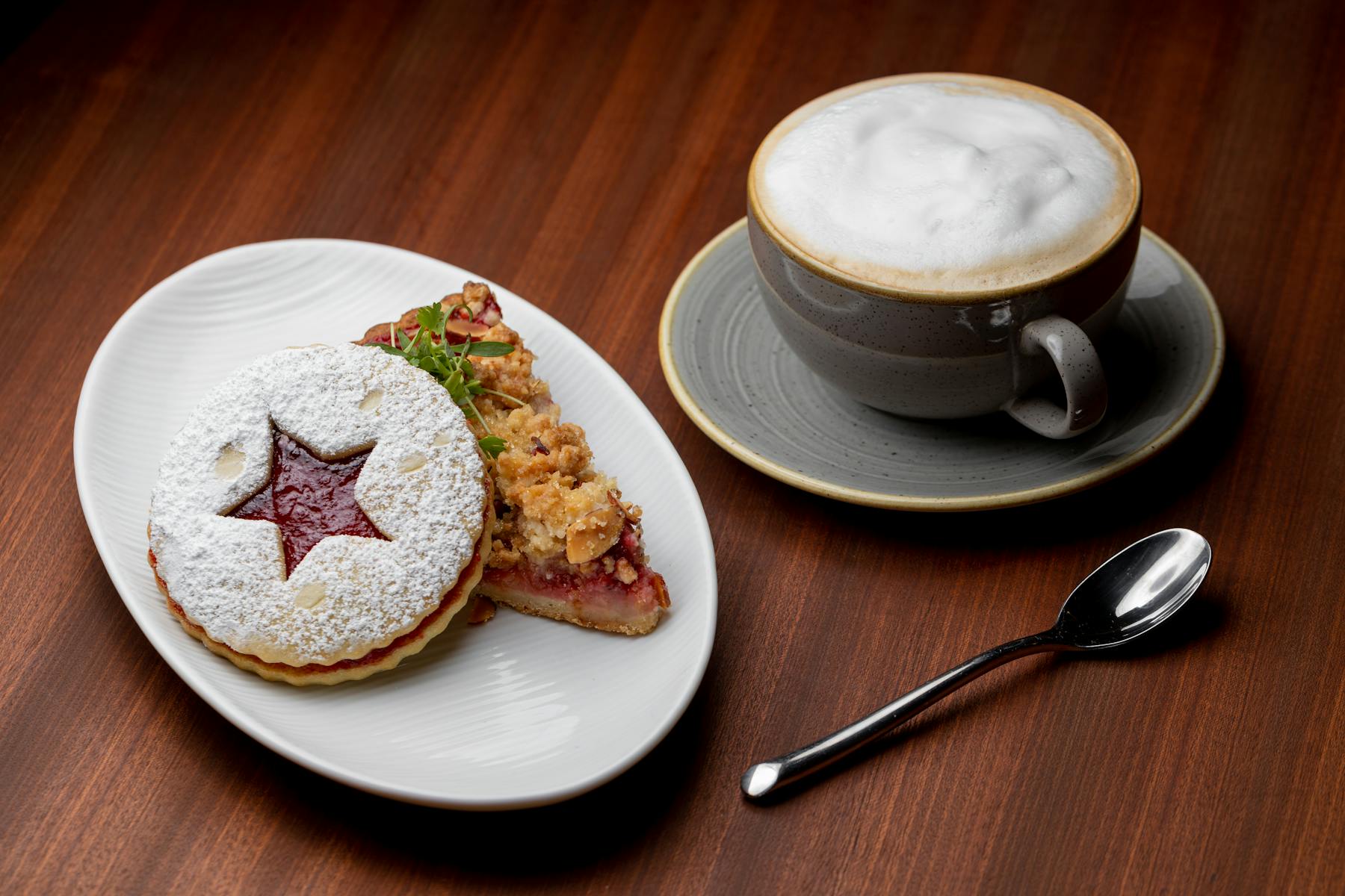 a plate of food and a cup of coffee