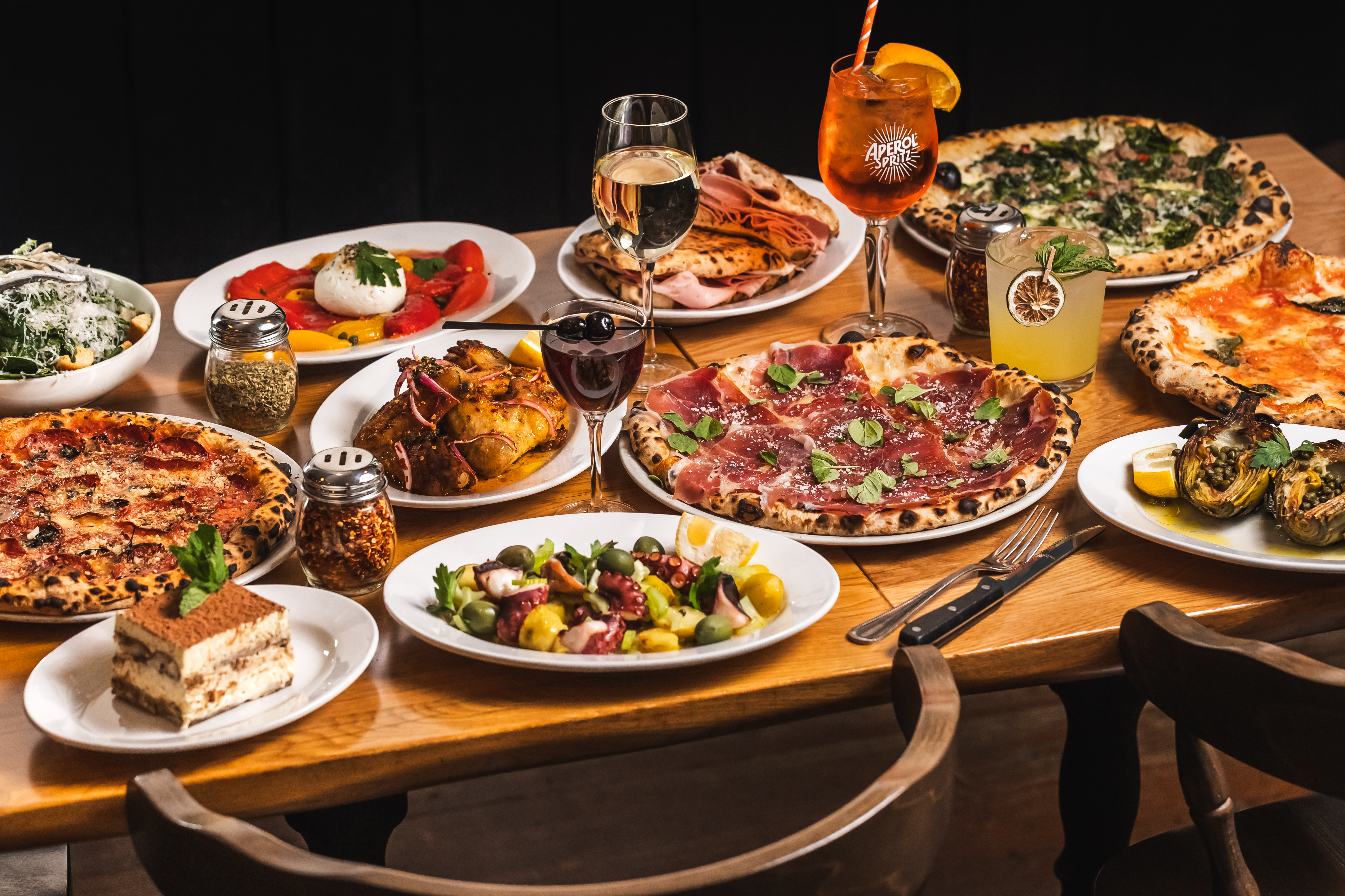a table topped with different types of food on a plate