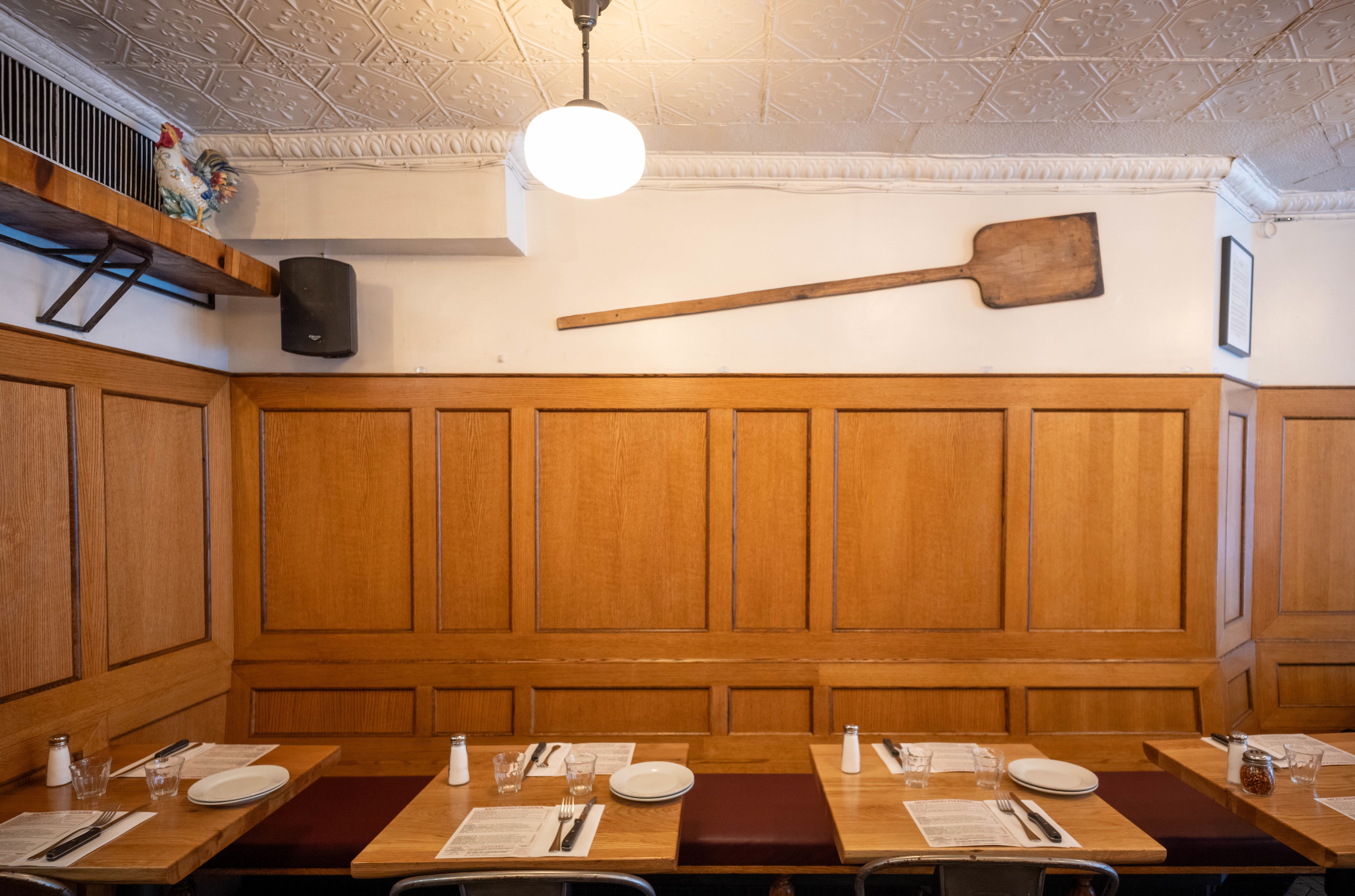 Motorino Pizzeria's East Village dining room with pizza peel