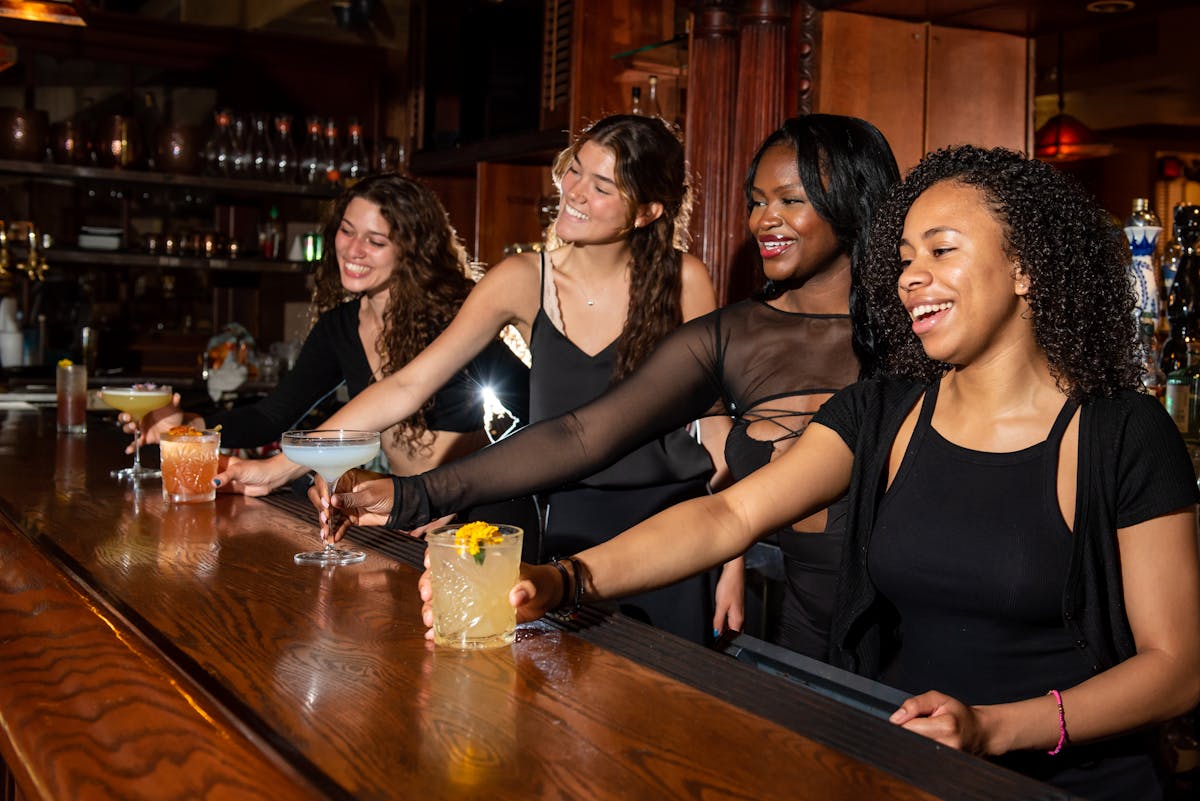 a group of people sitting at a table