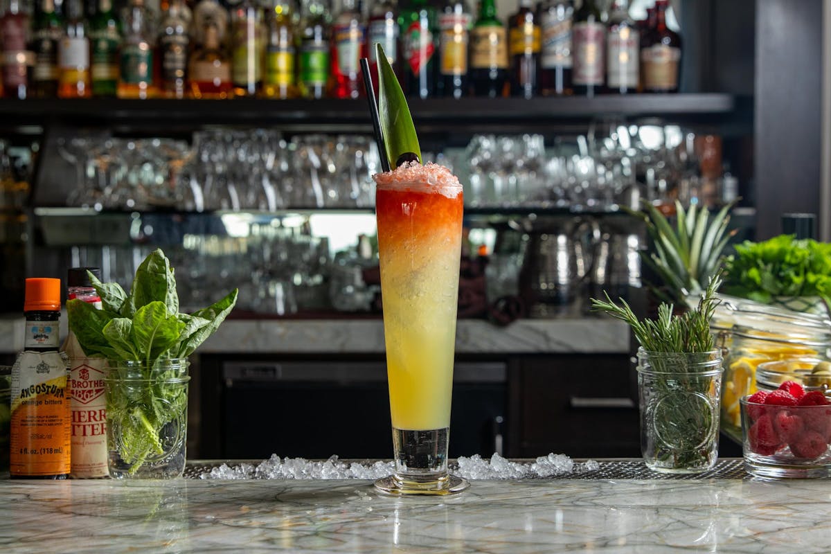 a cocktail on a bar counter top