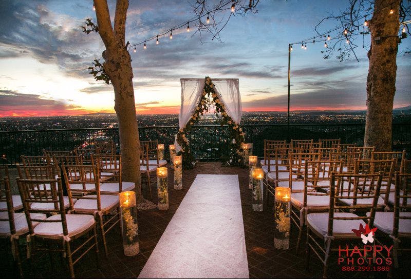 an outdoor wedding venue during sunset