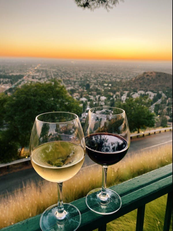 glasses of wine overlooking the view