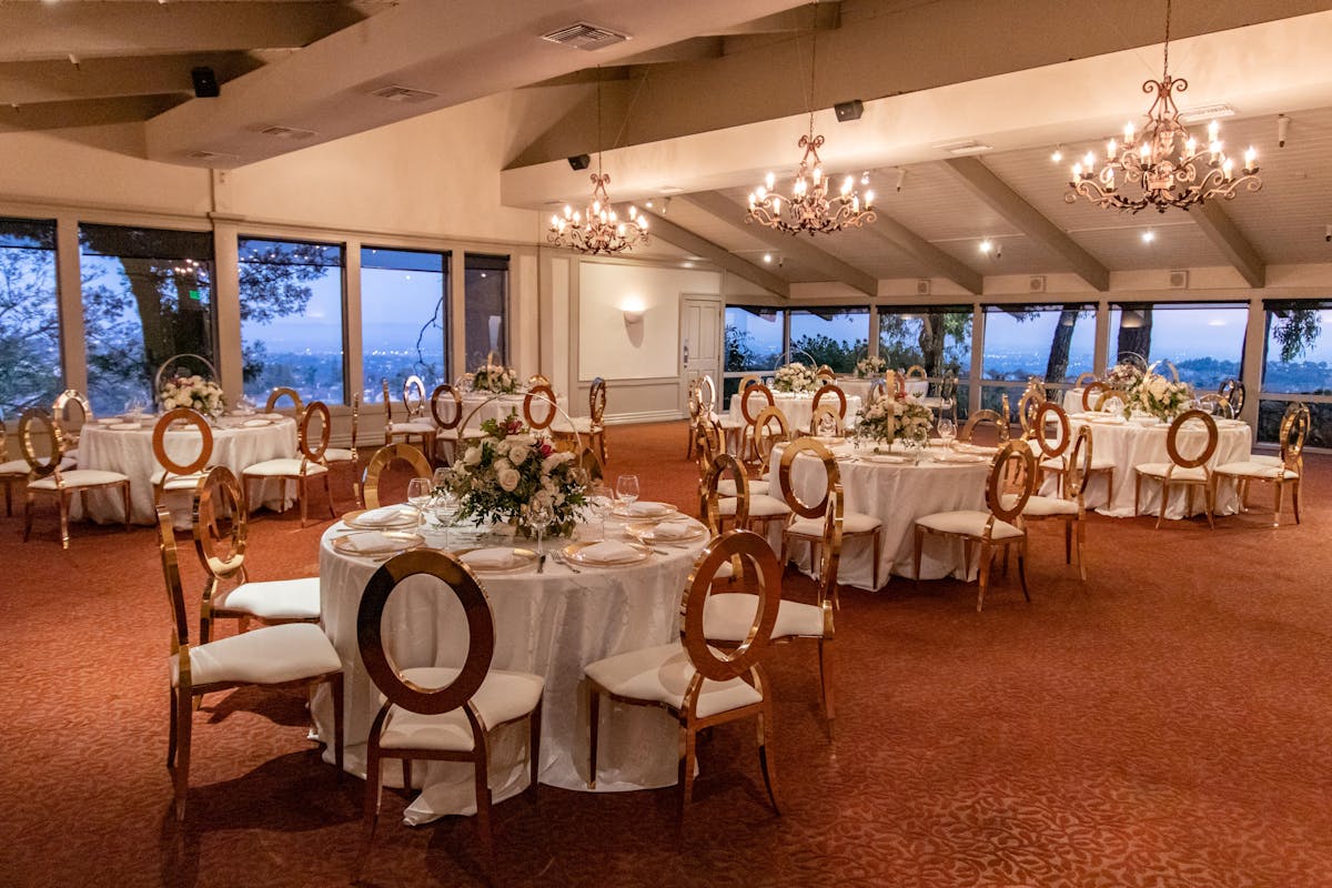 an event room with tables and chairs