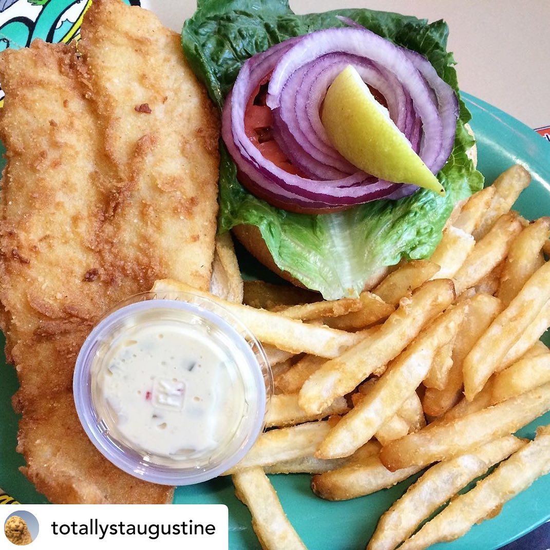 a sandwich and fries on a plate