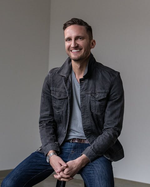 a person smiling for the camera