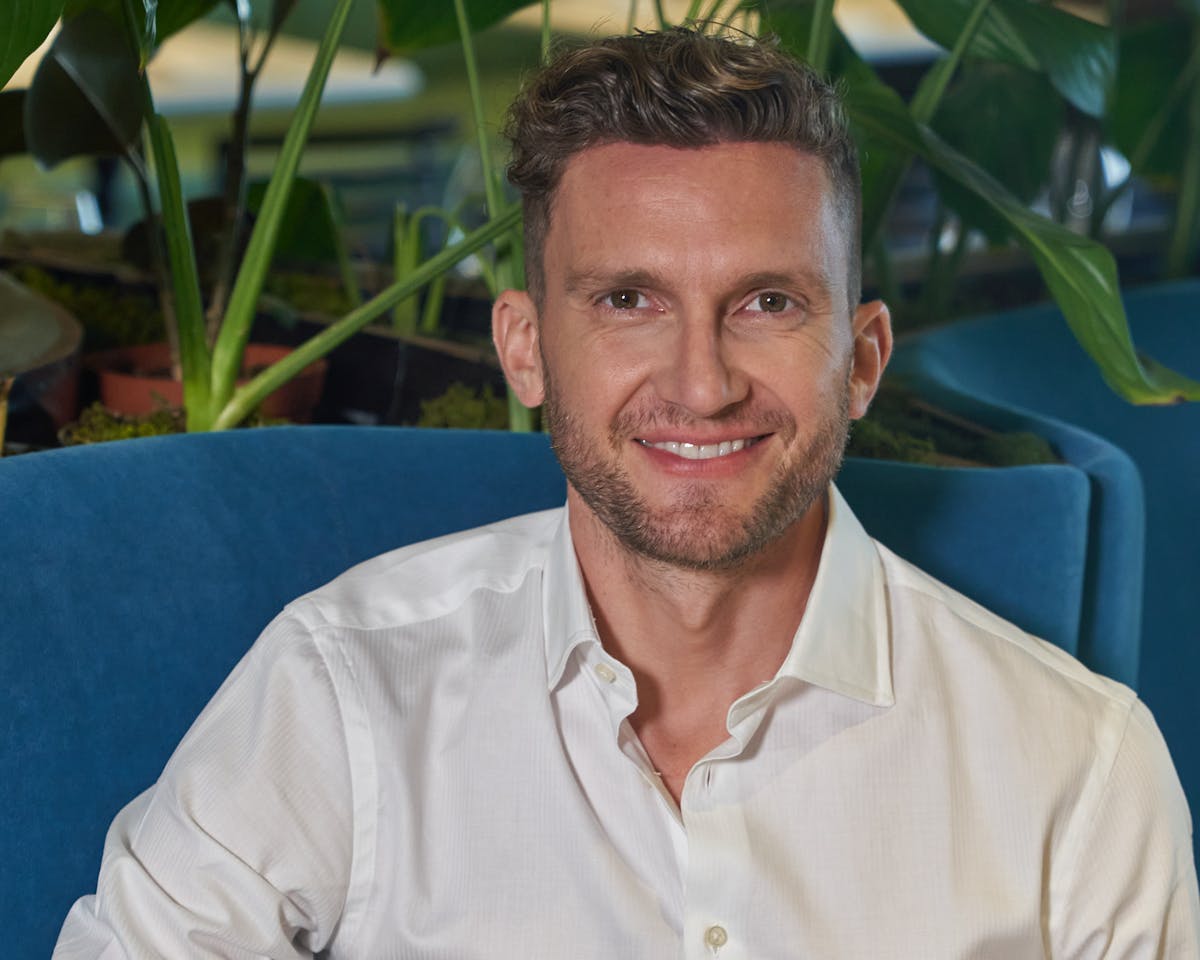 a man smiling for the camera