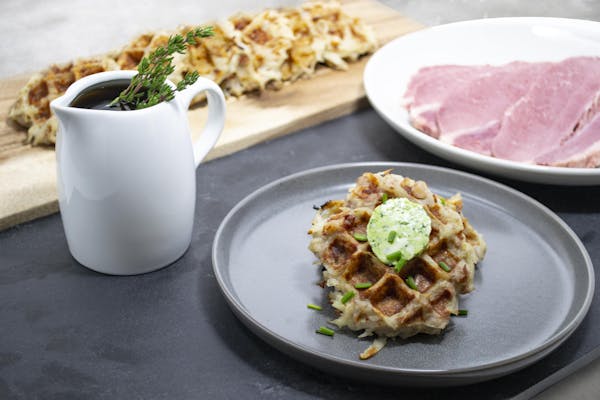 a plate of food and a cup of coffee