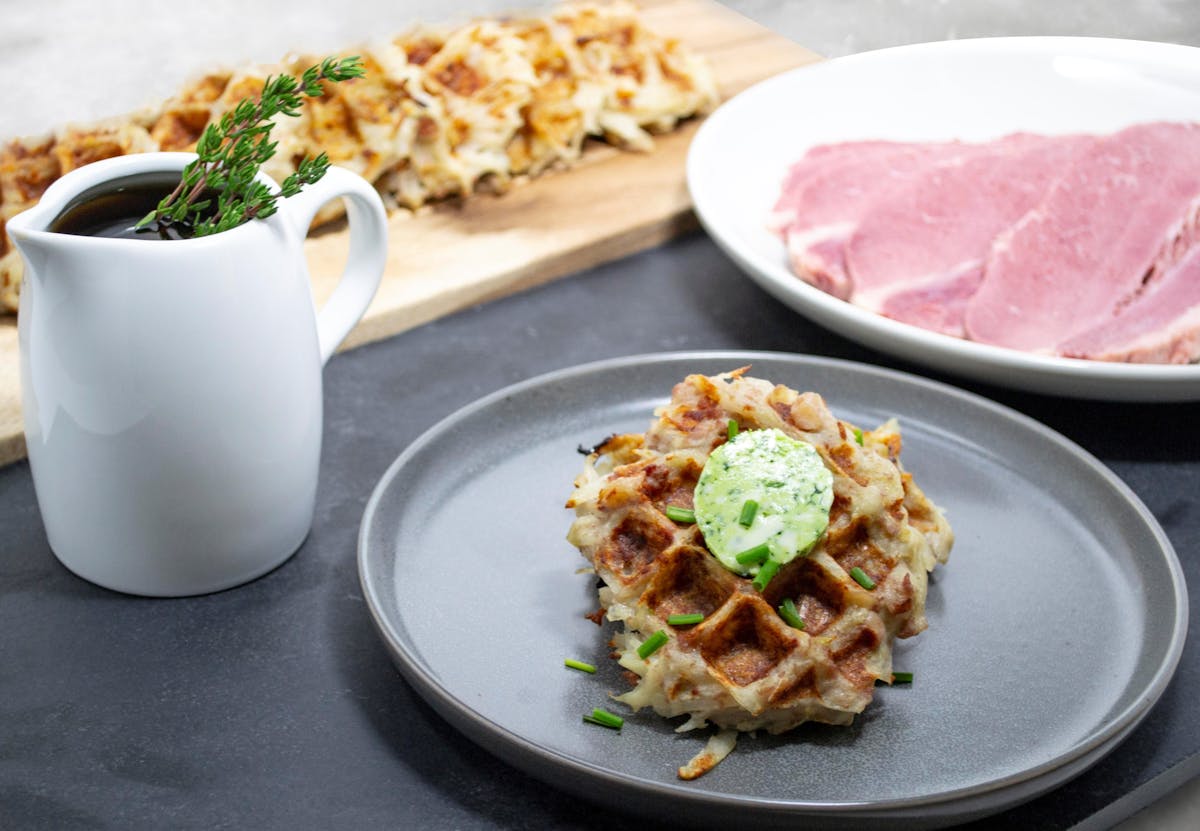 a plate of food and a cup of coffee