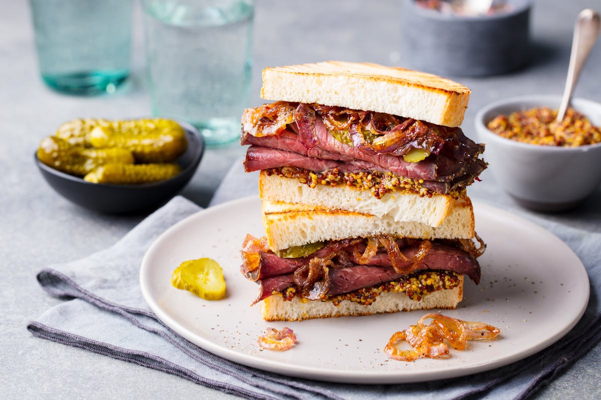 a sandwich cut in half on a plate