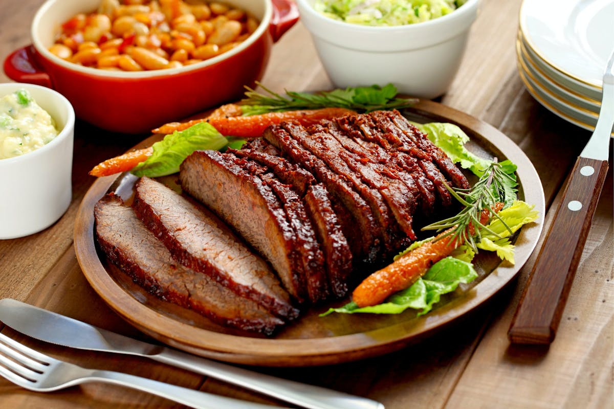 a plate of food on a wooden table