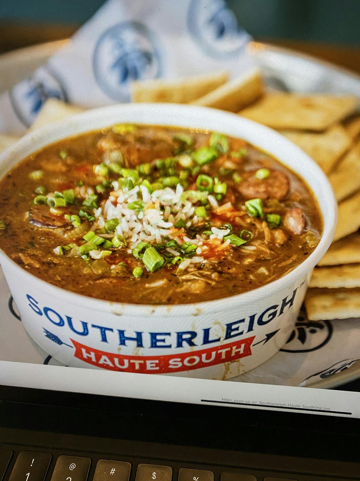a bowl of food sitting on a table